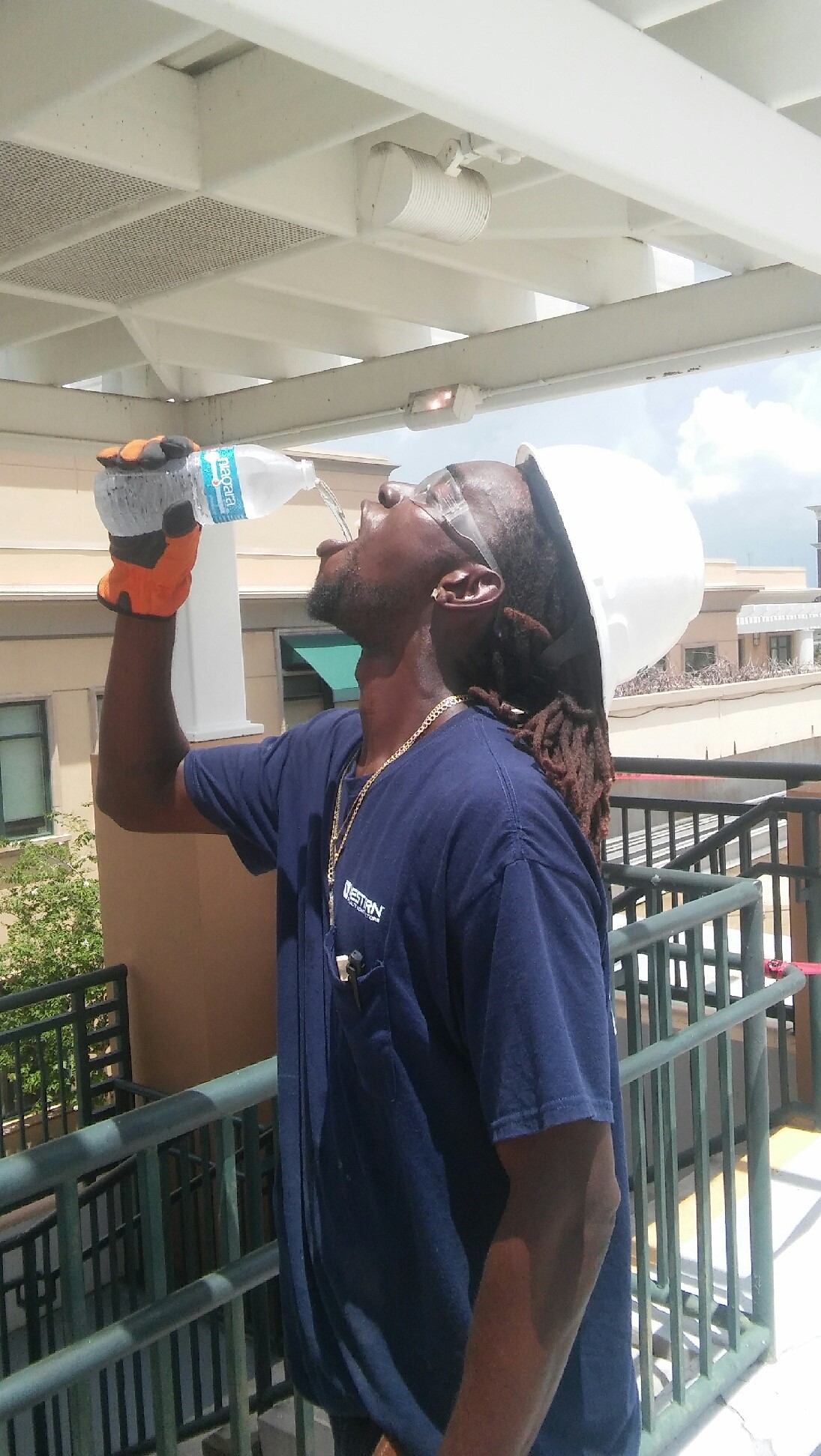 Western Worker Staying Hydrated in Heat