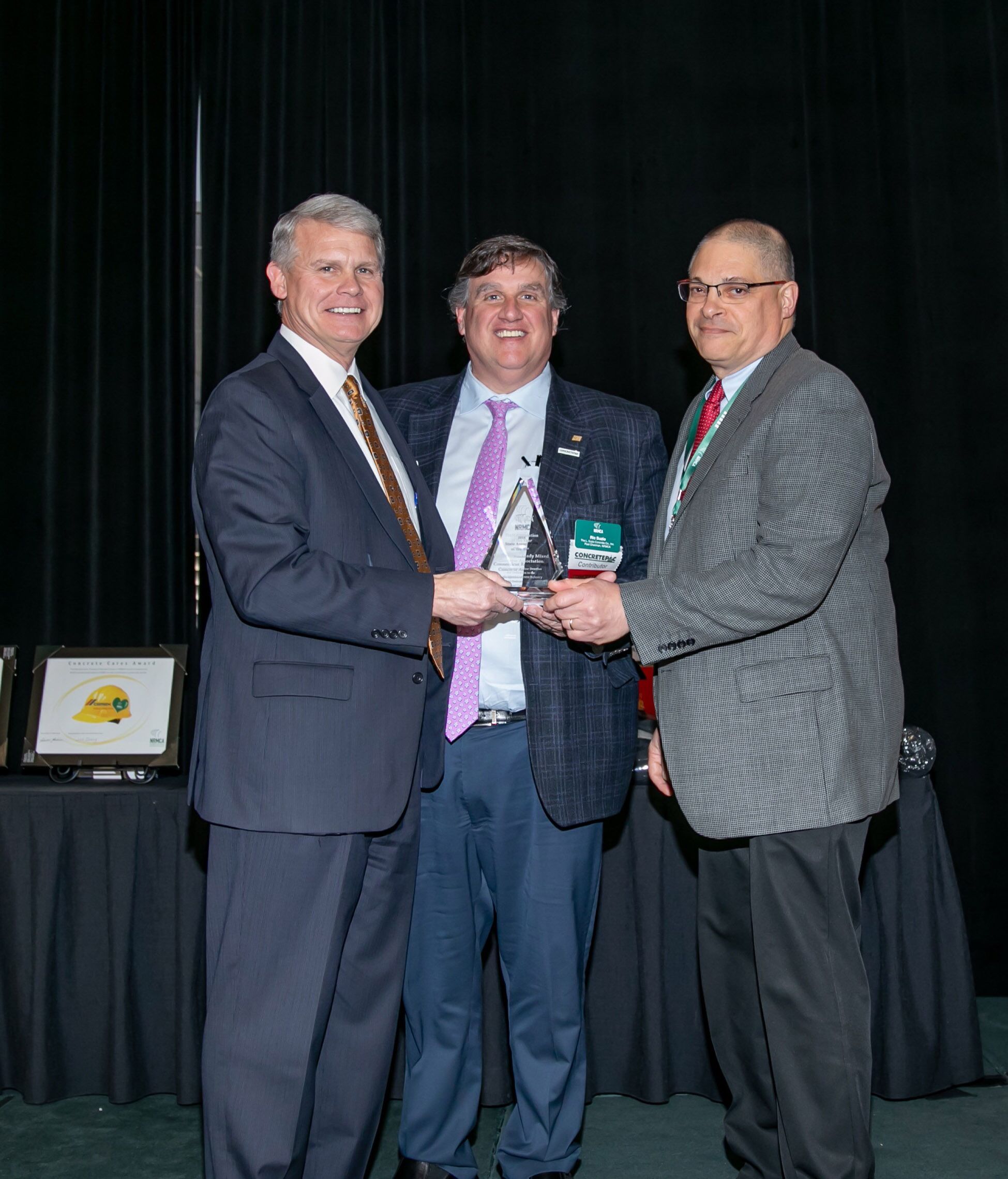 Left to Right: Rodney Grogan, past Chairman NRMCA; Ric Suzio, President, L. Suzio Concrete Company; Dominic Di Cenzo, Executive Director, Connecticut Concrete Promotion Council with the 2018 NRMCA State Affiliate of the Year Award for the Connecticut Ready Mixed Concrete Association.