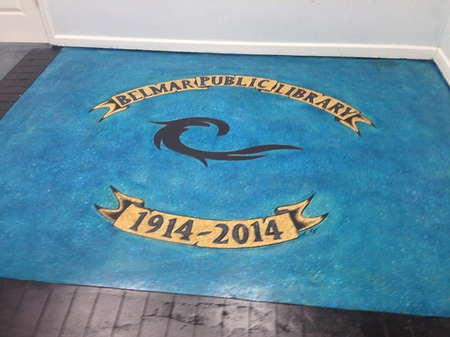 1914 - 2014 logo engraved into a blue concrete canvas