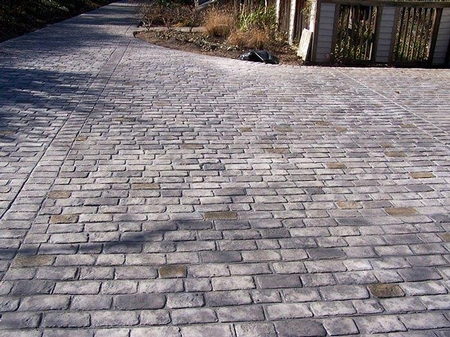 Brick patterned concrete driveway