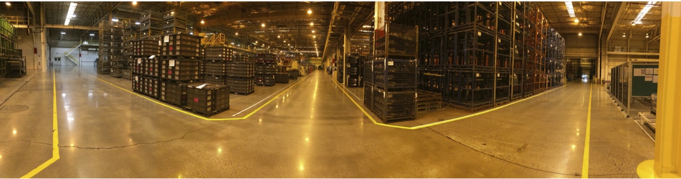 Panoramic view of warehouse aisle