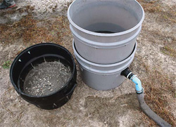 Using three stackable chambers to filter wash water, The Sludge Buster provides particle separation as well as chemical treatment.