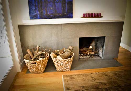 Wrap around concrete fireplace, baskets level to floor mantel. 