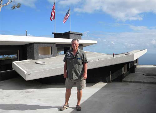Rod Hadrian of SCIP system provider Hadrian Tridi Systems stands on the roof of the Hiilani EcoHouse.