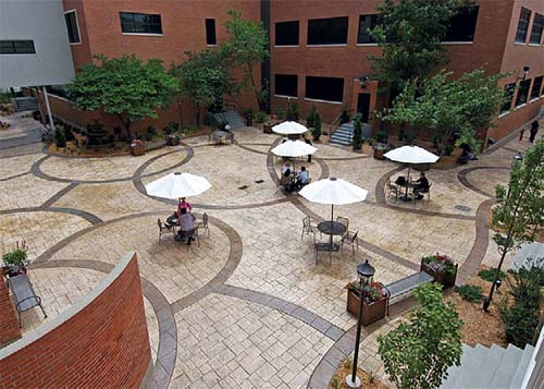  Doehring and his six-man crew transformed an area between the airliner-component companys cafeteria and administration buildings from unattractive sidewalks and grass into a place where employees take breaks, gather for meetings and eat.