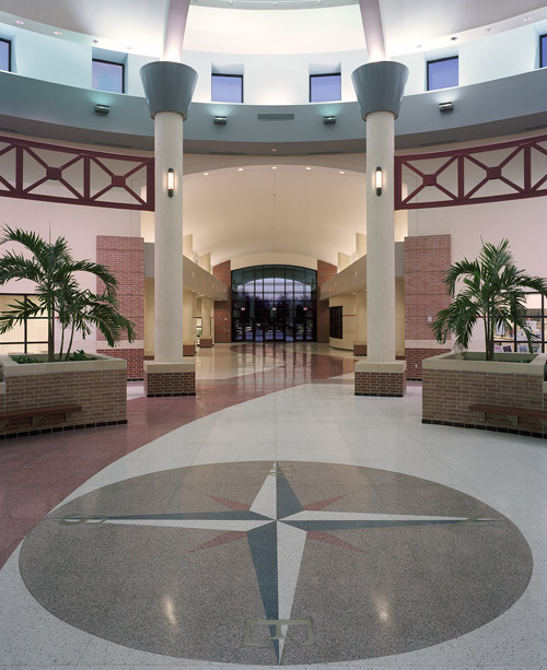 Terrazo compass rose in a busy commercial office building.