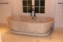 Many contractors use a densifier when constructing a concrete bathtub to reduce the porosity of the finished product.