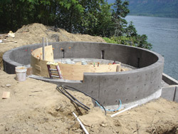 Brown poured the 10-inch-thick circular wall using a 3,500-psi concrete mix colored with Davis Colors Chameleon Mix-Ready dye system in Pewter, then moved on to constructing and pouring the half-moon seating structure, again using 3/8-inch-thick plywood pieces for the frame. 