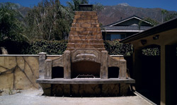 Sculpted and carved concrete fireplace -An old Disney contact reached out to Marshall Sr. for a project at a local continuation high school. 