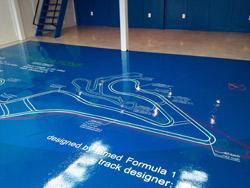 Mike Jensen of Atlanta Concrete Artist LLC created a map of the two-mile track at the Atlanta Motorsports Park using a Flattoo from Surface Gel Tek.