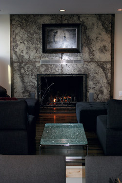 Fireplace surround that spans floor to ceiling.