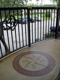 Polished and dyed concrete logo with a geographical artistic 3d star within a red circle.