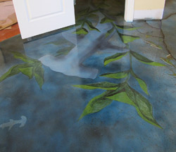 The floor with the hammerhead shark was done on gray concrete while the one with a dolphin was done on white. Photos courtesy of Concrete Mystique Engraving