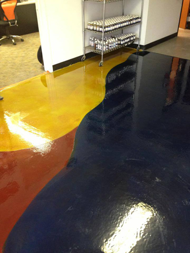 At The Stain Store's new location in north Austin, Texas, 600 square feet of flooring in the showroom and tool room was overlaid with Miracote MPC, scored with curved joints, then stained with Mirastain II alcohol-based stain, Butterfield Elements. 2