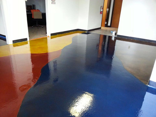 At The Stain Store's new location in north Austin, Texas, 600 square feet of flooring in the showroom and tool room was overlaid with Miracote MPC, scored with curved joints, then stained with Mirastain II alcohol-based stain, Butterfield Elements. 1