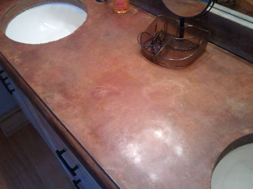 A double sink is embedded into this countertop and is edged with z-counterform products.