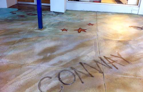 The name of the seafood store Conway was added to the concrete floor.