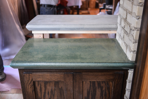 Two completed concrete countertops that were created with edge forms made by z-counterform.
