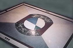 Terrazzo and  Decorative Overlayment to create a crisp clean logo