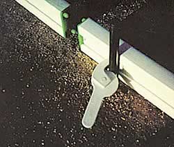 Plastiform forms have a very easy cam-lock clamp that fastens the forms to the concrete stakes.