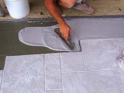 Renew Crete Stampable concrete Overlay Mix is easy to apply and gives the contractor a peace of mind that the product is quality. Troweling an overlay mixture before stamping it to look like stone tile.