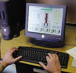 Color Select Pro Liquid Dispenser software on a really small computer screen is used to dose concrete mix with pigment for integrally colored concrete