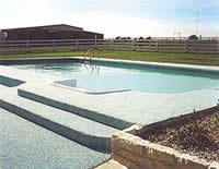 Pebble-Flex System used on a pool deck does not face from UV exposure.