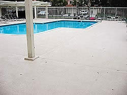Perfect for a pool deck, Kwik-Top is a polymer modified cement specially formulated to renew concrete