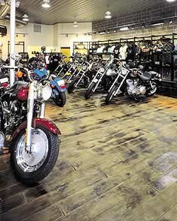 Indoor stamped concrete has increased in popularity as seen in this motorcycle shop.