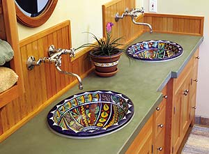 green Concrete Countertop with decorative sinks takes this washroom to the next level.