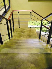 Colormaker Floors concrete coatings product used on busy high school stairs.