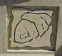 Abstract acorn in concrete made by using a concrete formliner. Decorative forms by Greenstreak Inc.