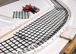 Installation of carbon-fiber grids is specifically designed for the lightweight reinforcement of concrete in countertops as well as in a multitude of precast and prestressed concrete products.