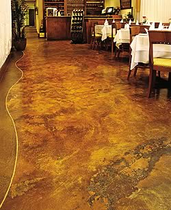 This stained floor in an upscale restaurant proves to be both durable beautiful in high-traffic areas