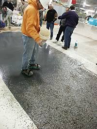 Placing terrazzo is an art, making sure all the pieces are where you want them prior to the material setting.