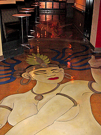 A concrete floor is a perfect canvas of an artistic installation as seen here of a woman created with Super Krete products.