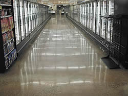 Diamond Polished Floor in a busy freezer aisle at a grocery store.