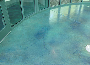 There are limits to how many layers of color can be built up on top of one another. One limit is the availability of free lime, which acid stains need to react with. Each layer of acid stain uses up some of the free lime in the cementitious surface. Once all lime is gone, so is the ability of the cementitious surface to take further acid stain