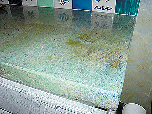 Concrete Countertop - The more a contractor practices and experiments with layering color, the better the final results of a layered stain job are likely to be.