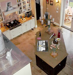 Decorative Concrete Home kitchen viewed from above with a trapezoid shaped concrete countertop.