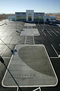 Logos can be stenciled onto existing concrete using a reverse stencil gives depth.