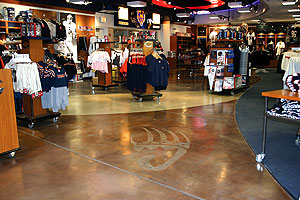 Chicago Bears' Team Store has a light etched paw print in the stained concrete floor.