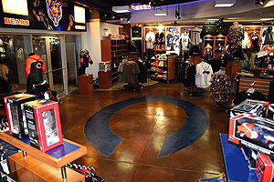 Chicago Bears' Team Store blue logo carved into a stained concrete floor.