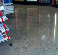 Polishing Concrete - RetroPlate with exposed aggregate in a retail setting.