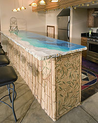 JAF-Co Concrete built this cabana style concrete countertop with layers of the ocean theme from a sandy beach to the deep blue sea