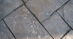 Problems with concrete sealers - Examples of sealer delamination, possibly due to the use of salt or de-icing chemicals.