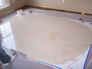The brown and gold stenciled overlay shown at an earlier stage of the work.