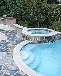 Tom Ralston - Oyster White/Sandstone Color-Texture Combination on a concrete pool surround and hot tub.