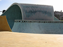 Concrete wave at a skate park was colored with acid-stain