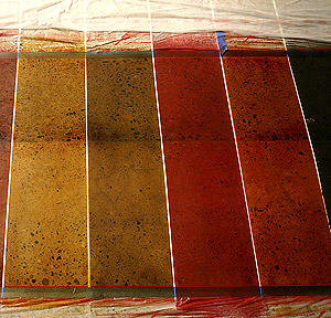 A test slab with four sample colors of a dye, made for the benefit of a client.